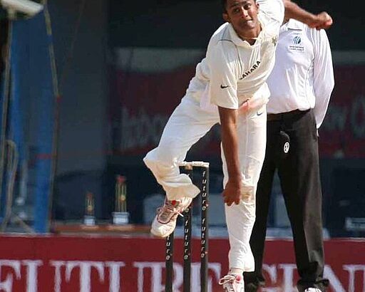 Anil Kumble bowling with a bandaged jaw during the 2002 Antigua Test against West Indies after suffering a fractured jaw